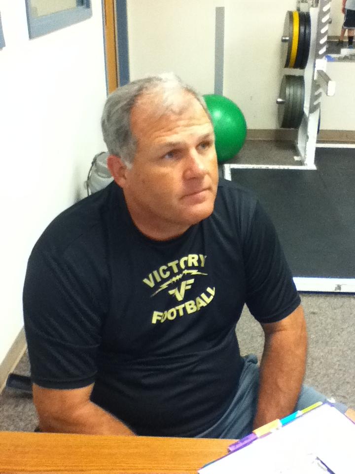 Football coach Steve Casey keeping an eye on his class.