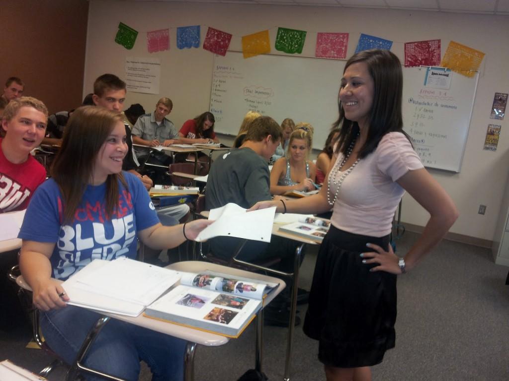 Sarah Lotz hands out Spanish worksheets in her second hour. 