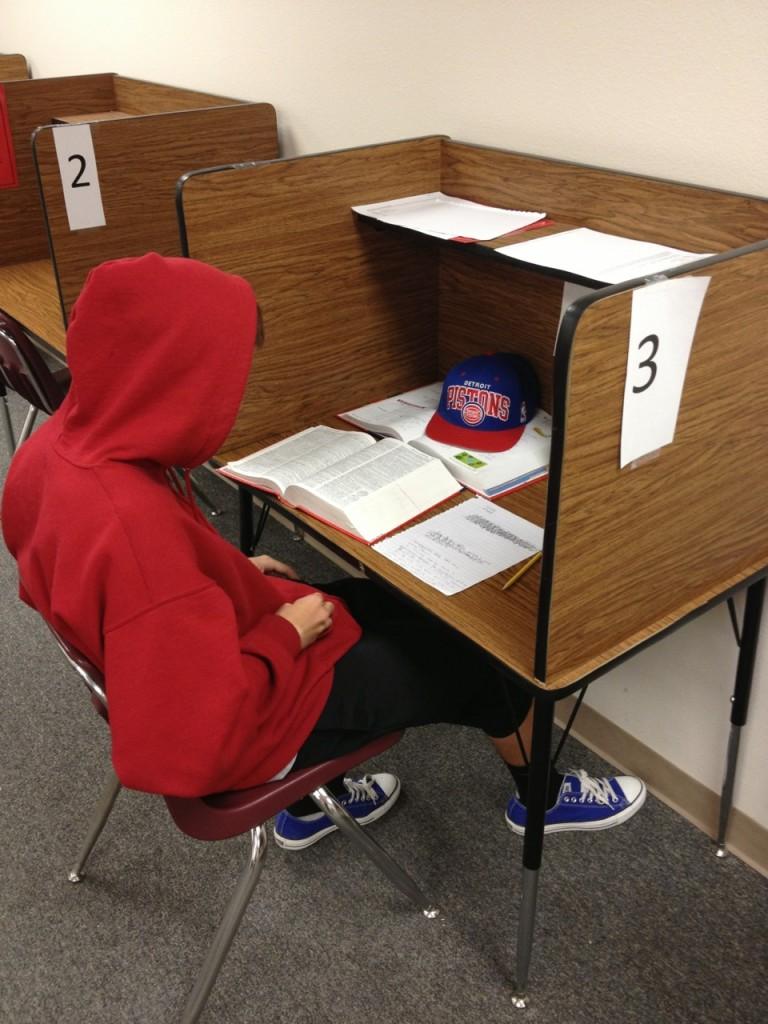 PHOTO BY JASMINE ELMI 
Trevor Blinn, sophomore at OHS, was sent to Sweep to finish up school work.