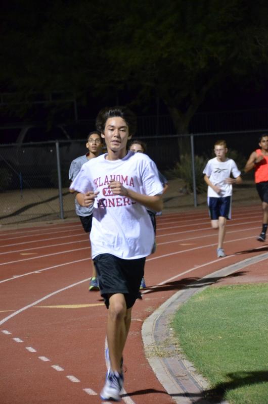 Trevor Glosson, junior, at a night practice in August.