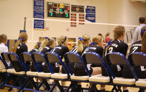 OHS girls varsity volleyball team engaged in the game.