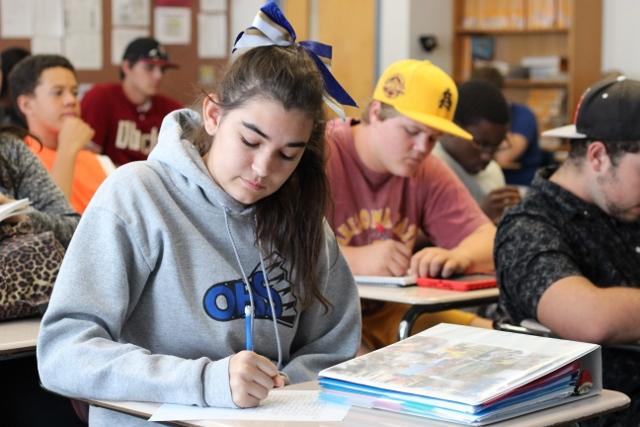 Hannah Carpenter, OHS junior, focuses on taking good reading notes during her Language Arts class to study from later.