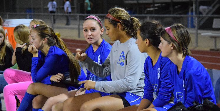 The+benched+girls+wait+for+their+play+during+the+game+against+Maryvale