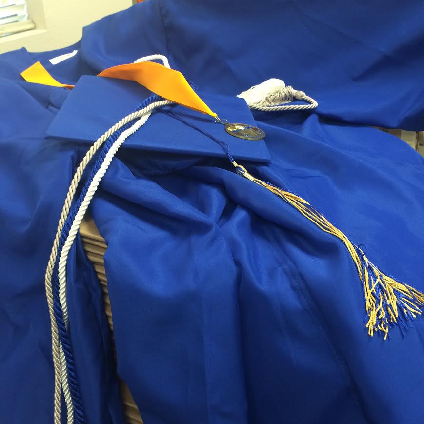 PHOTO+BY+TAYLOR+STOKES%0D%0AOn+May+29%2C+graduating+seniors+will+make+their+way+toward+their+futures%2C+while+adorned+in+the+OHS+colors+of+blue+and+gold%2C+by+accepting+their+diplomas+at+the+University+of+Phoenix+Stadium.