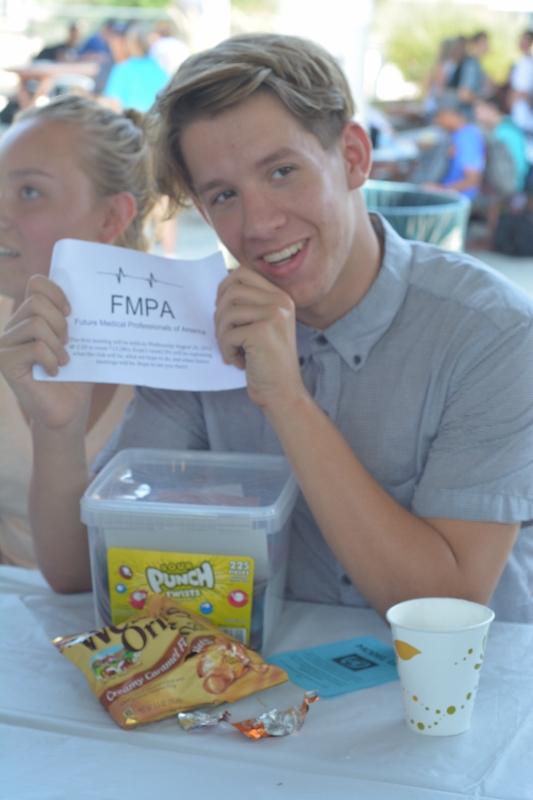 Colton Flowers, senior, promoting his club.