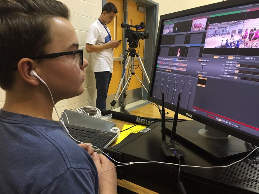 Broadcast team working hard to keep the first broadcast going as palnned