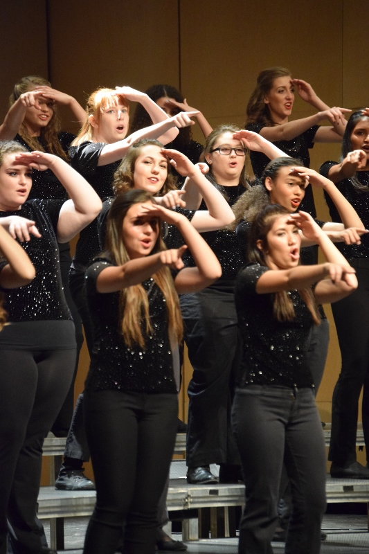 The concert choir sings “Dancing Queen” by ABBA during their performance. 