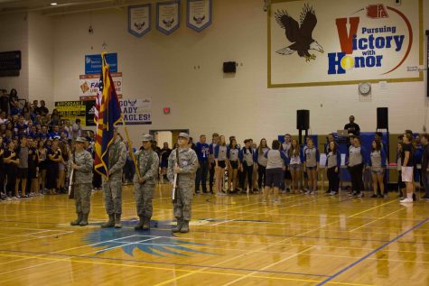 ROTC conducts the presenting of the colors, ready for the National Anthem to be sang by Honor Choir. 