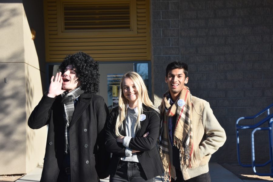 Seth Moller (left), Mattie Jones (middle), and Owais Salahudden (right), seniors, dress as characters from the show Parks and Recreation