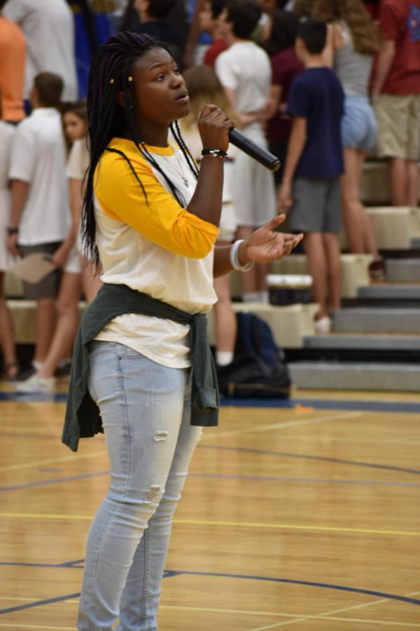 Gabby Ilunga-Kabamba, sophomore, sings National Anthem at assembly.