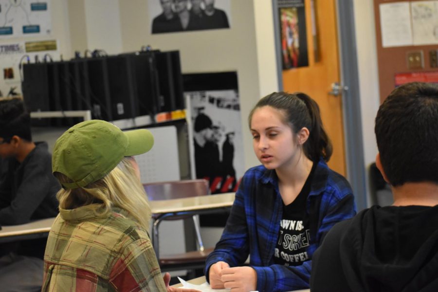 Students Addison Bowman, junior, and Peyton Thompson (freshman) practice interviewing each other.