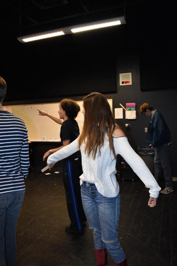 (Left to Right) Seniors One Griffin, Olivia Hsu and Aaron Sims, rehearsing for The Little Mermaid.