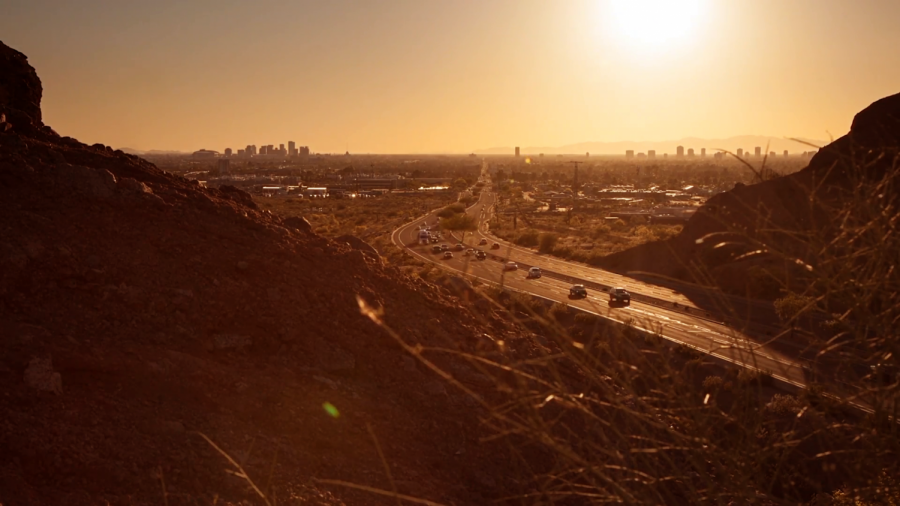 Photo courtesy of Video Blocks user Clippn. A screencap from the timelapse of an Arizona sunset taken above a highway.