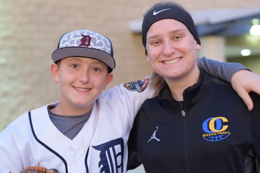 Jake Denstone (freshman) and Brooke Schroeder (sophomore) sport their spirit while participating in Tuesdays exercise day.