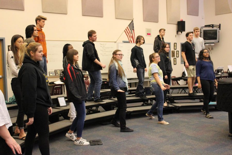  Honor choir practices on March 7 in class, singing “Shut De Do” ahead of the festival