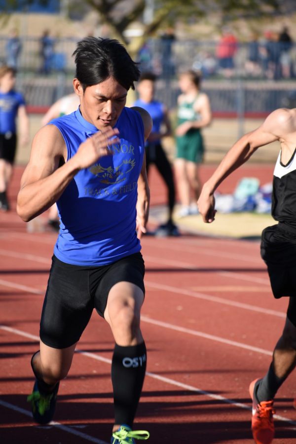 Ryandy Barrido, senior, runs his best on home track meet of the season. 