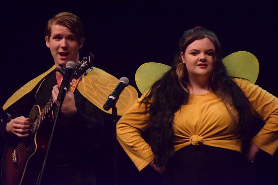 Bryce Craig (left) and Lauren Coe (right), both seniors, perform the song Honeybee, by the band Steam Powered Giraffes.