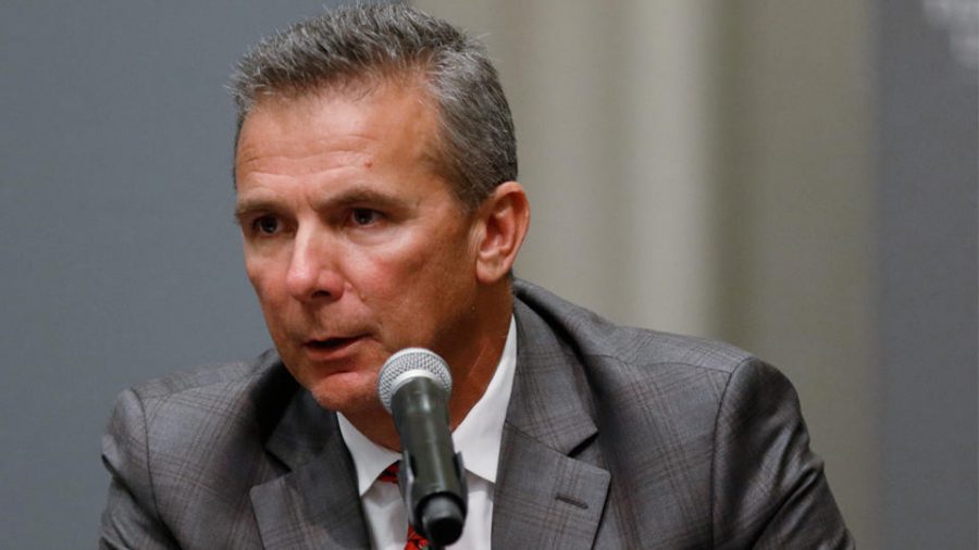 Ohio St. coach Urban Meyer answers questions at a press conference.
