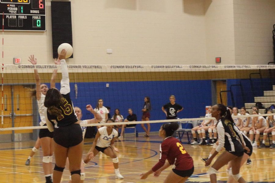 The JV team goes up for a block against Chaparral on Oct. 2. OHS won 2-0