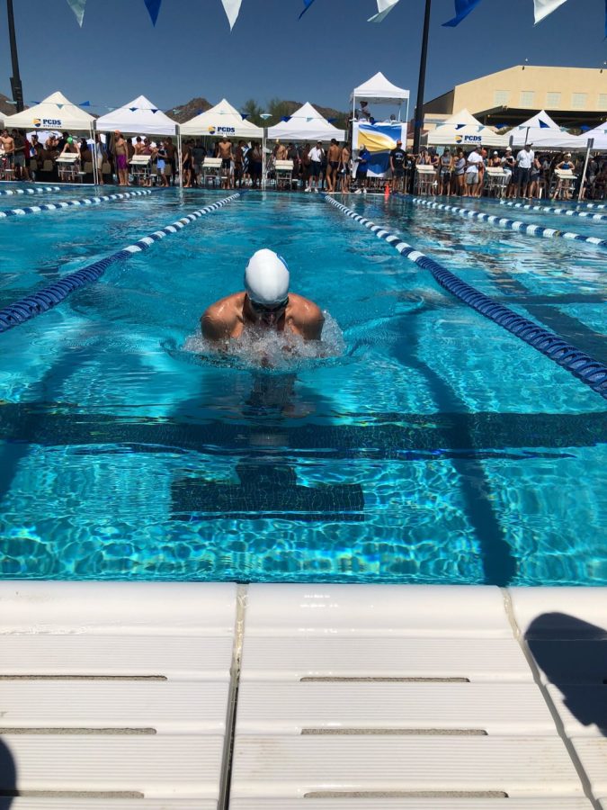 Student races to the finish line as fast as he can.
