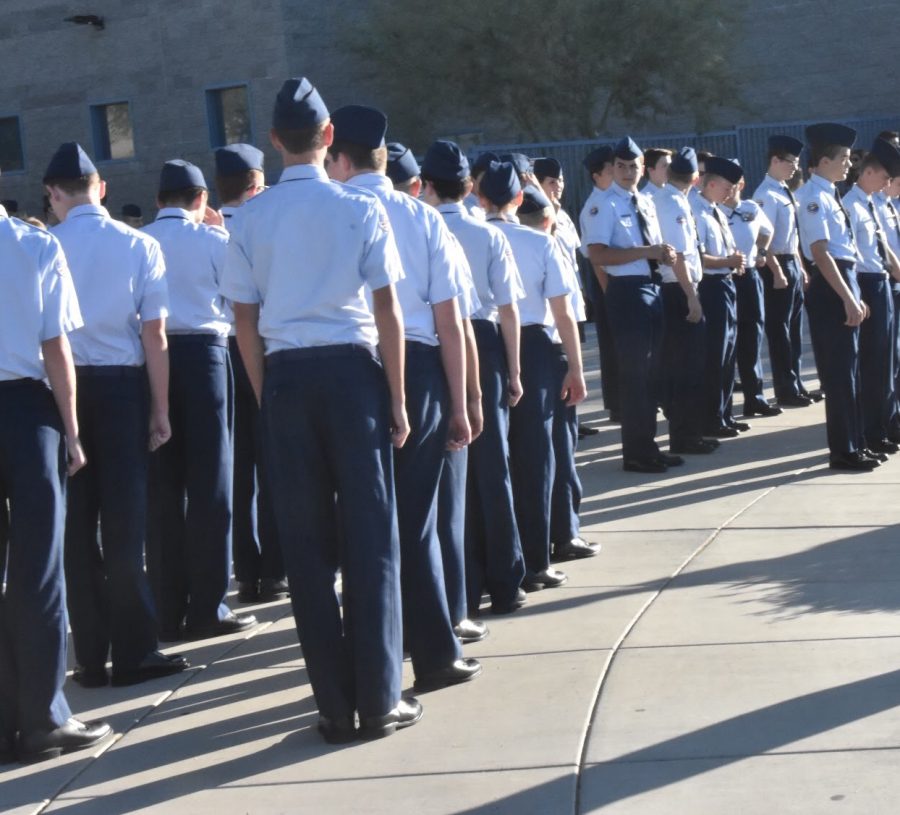 ROTC+greets+students+as+they+enter+school.