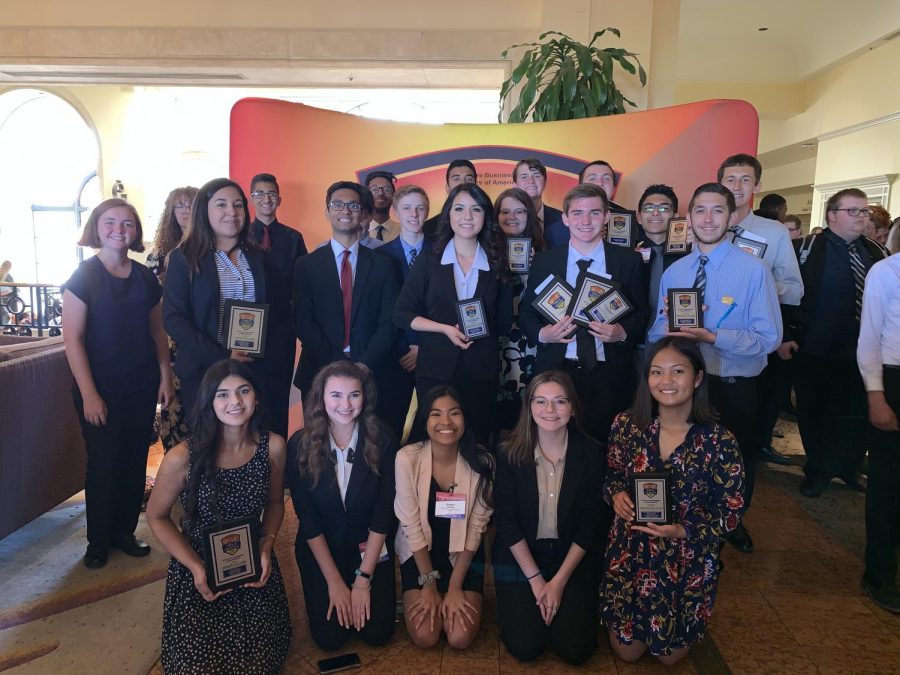 FBLA poses with their hard earned awards from the competition