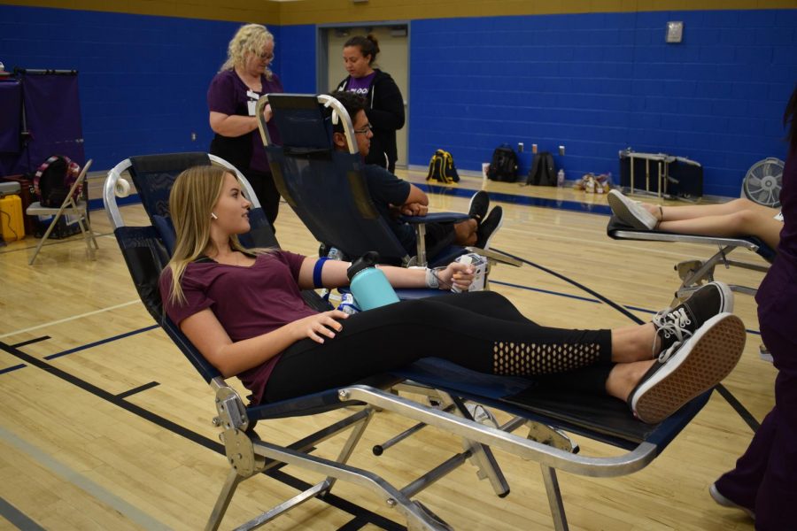 Lauryn White, junior, and other students donate blood to Vitalant: a small act that has the ability to save lives.
