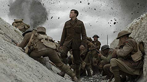 Lance Corporal Schofield stands in a trench as the German artillery hits 