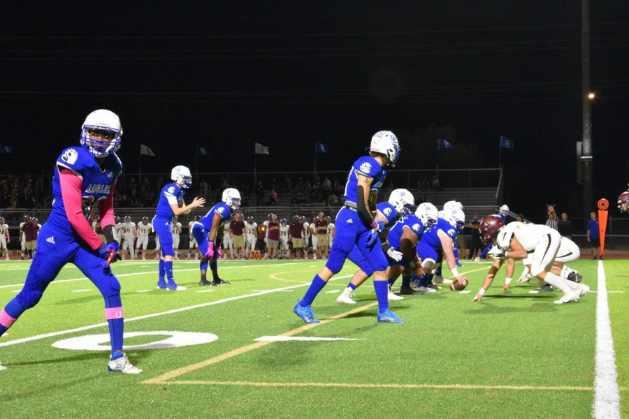 Varsity football lining up against Shadow Ridge defense.