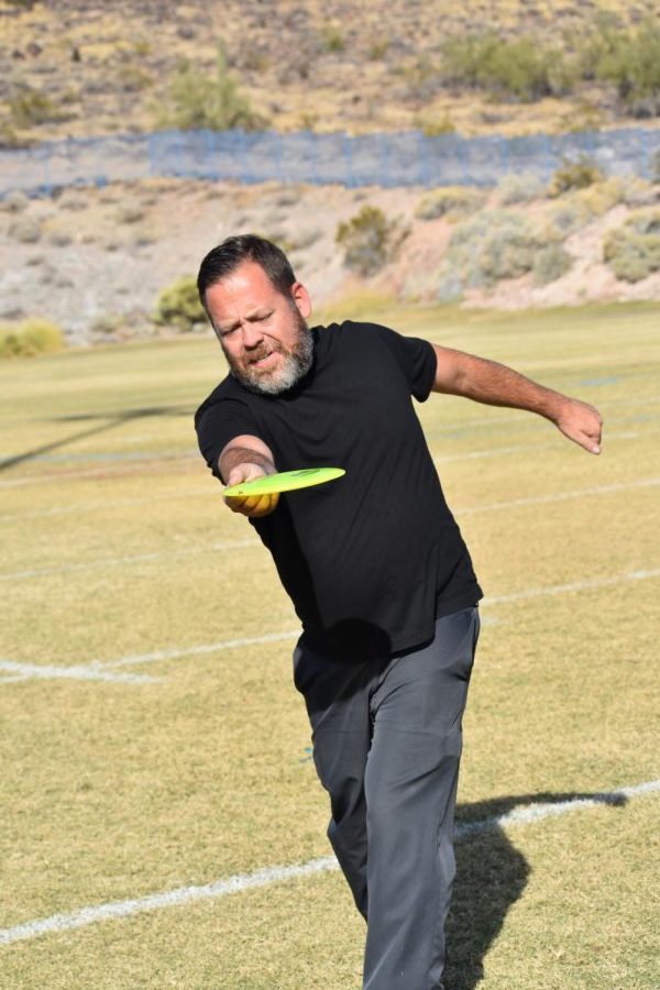Andrew Cardon, math teacher, displays his disc golfing skills.