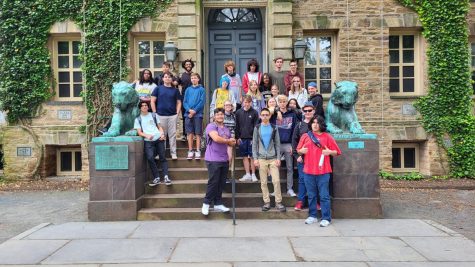 Students in the Academy of Civic Engagement and Advanced Studies stop for a picture while on a tour of Princeton University.
