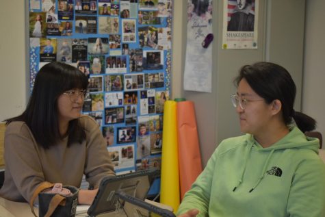 Sylvia Cheng (left), freshman, and Cindy Cheng (right), sophomore,
converse during their digital communications/journalism class.