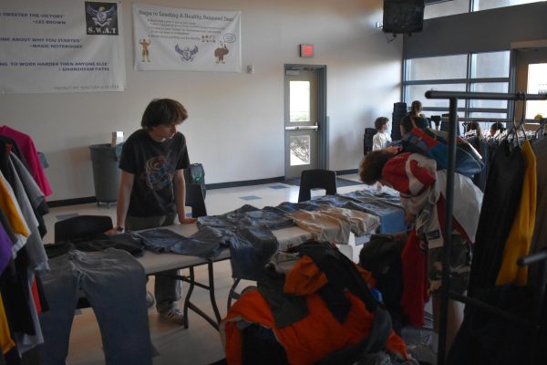  Gunner Power, senior, sells vintage clothes to other students. 