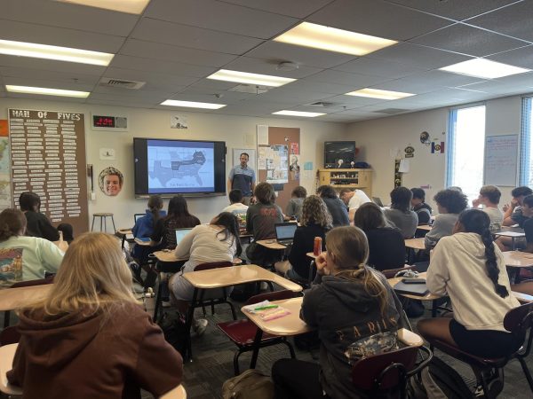 Students attend an APUSH review session with Mr. Cross, history teacher.