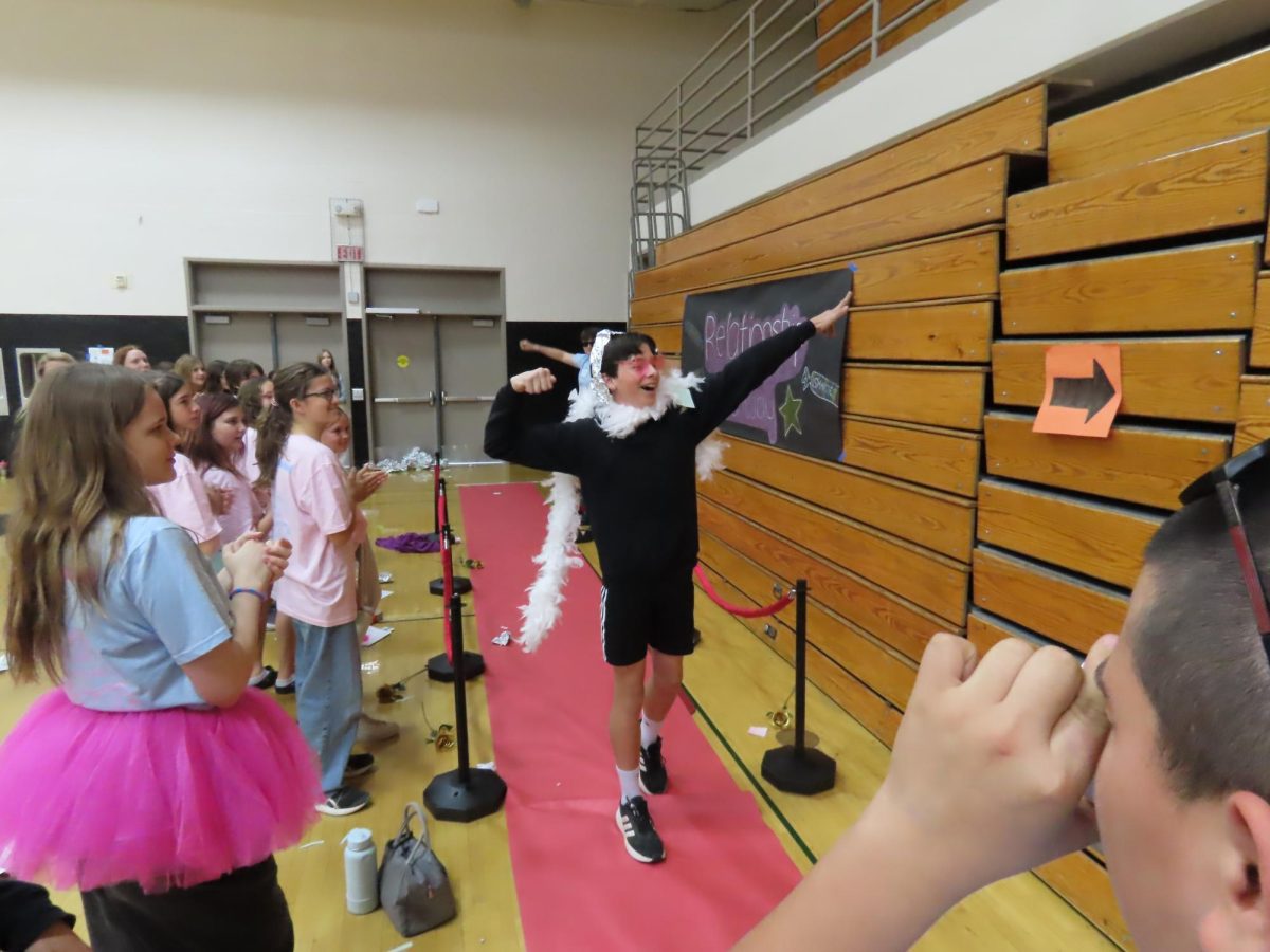  Attendees put on a fashion show for the ‘Relationship’ station at summit