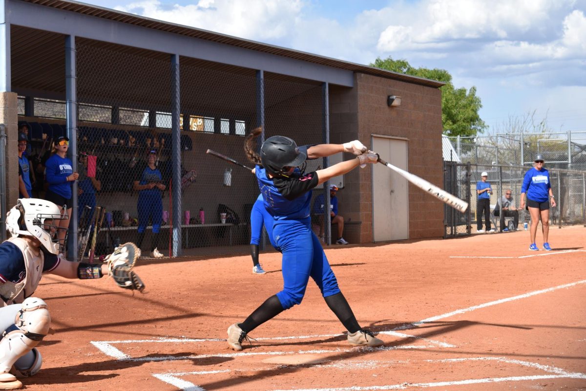 Charleigh Schuettler, senior, scores an RBI during the winning game against Perry.
