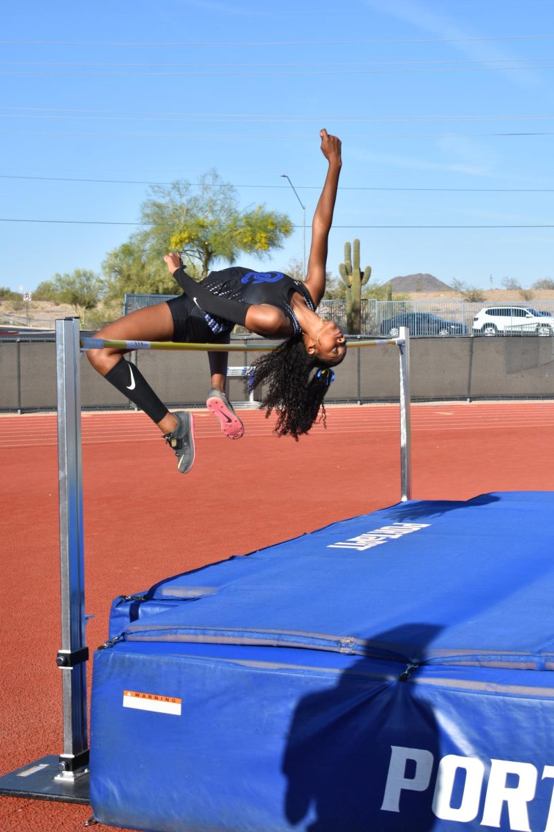 OHS student competes in her event at track meet.
