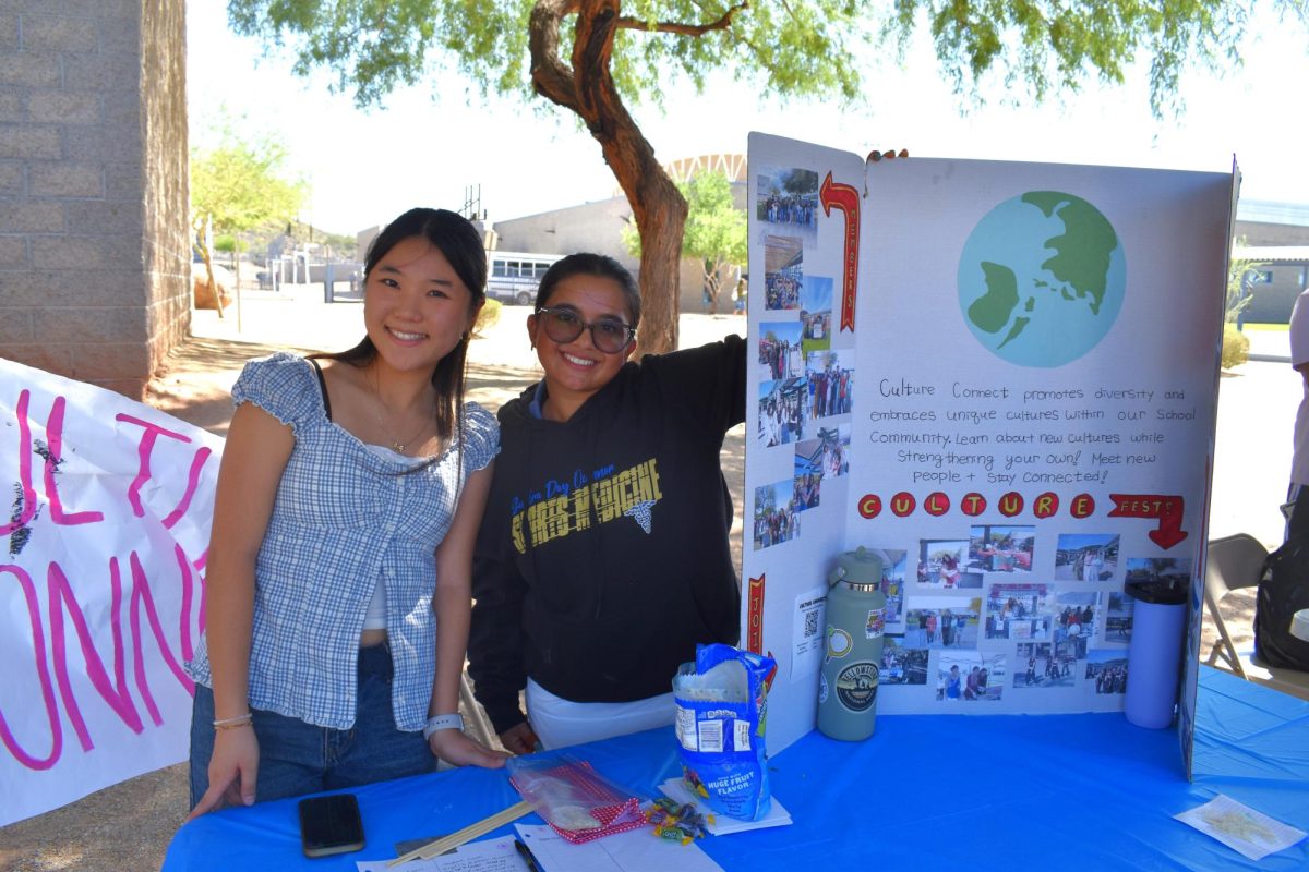 Nicole Eom and Aleena Pirzada from Culture Connect at their booth during Club Rush.