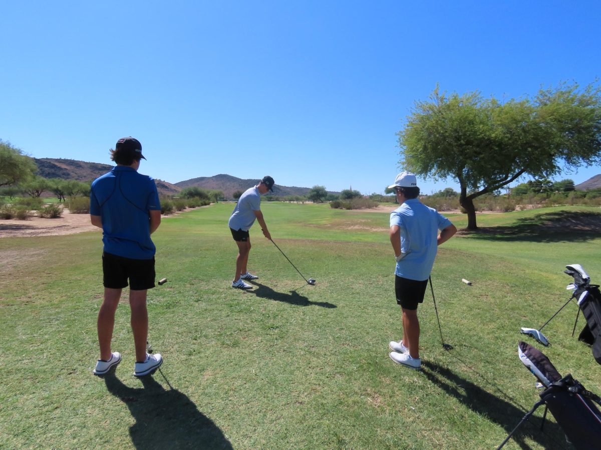 Skies are clear as some friendly golfers play in the heat.