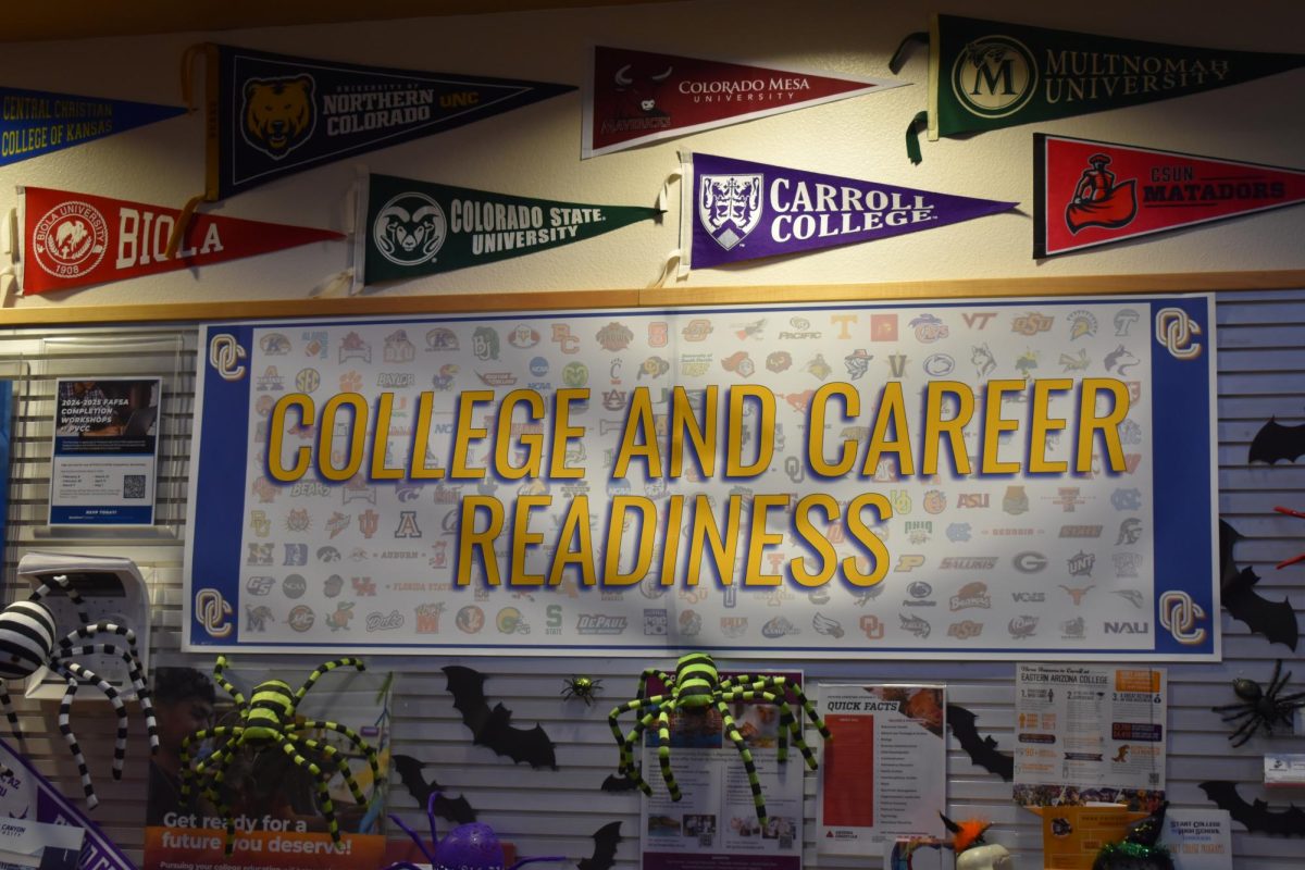 The Counselor's Office displays posters and flyers for college resources.