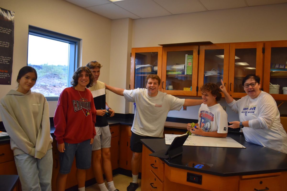 Student athletes in Mrs. Eick's AP Environmental class gather for a fun in-class assignment.