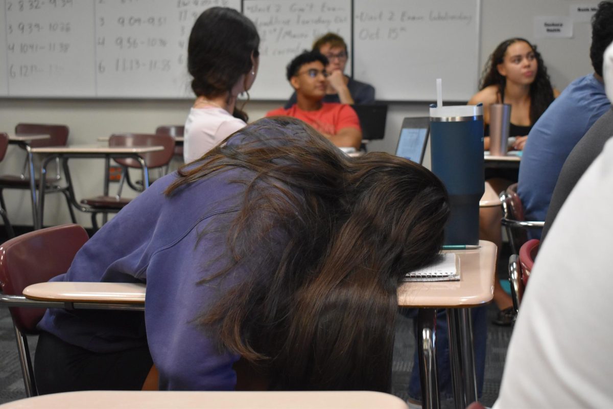 Nikka Senczakowicz-Gibo, senior, catches up on her sleep during class.