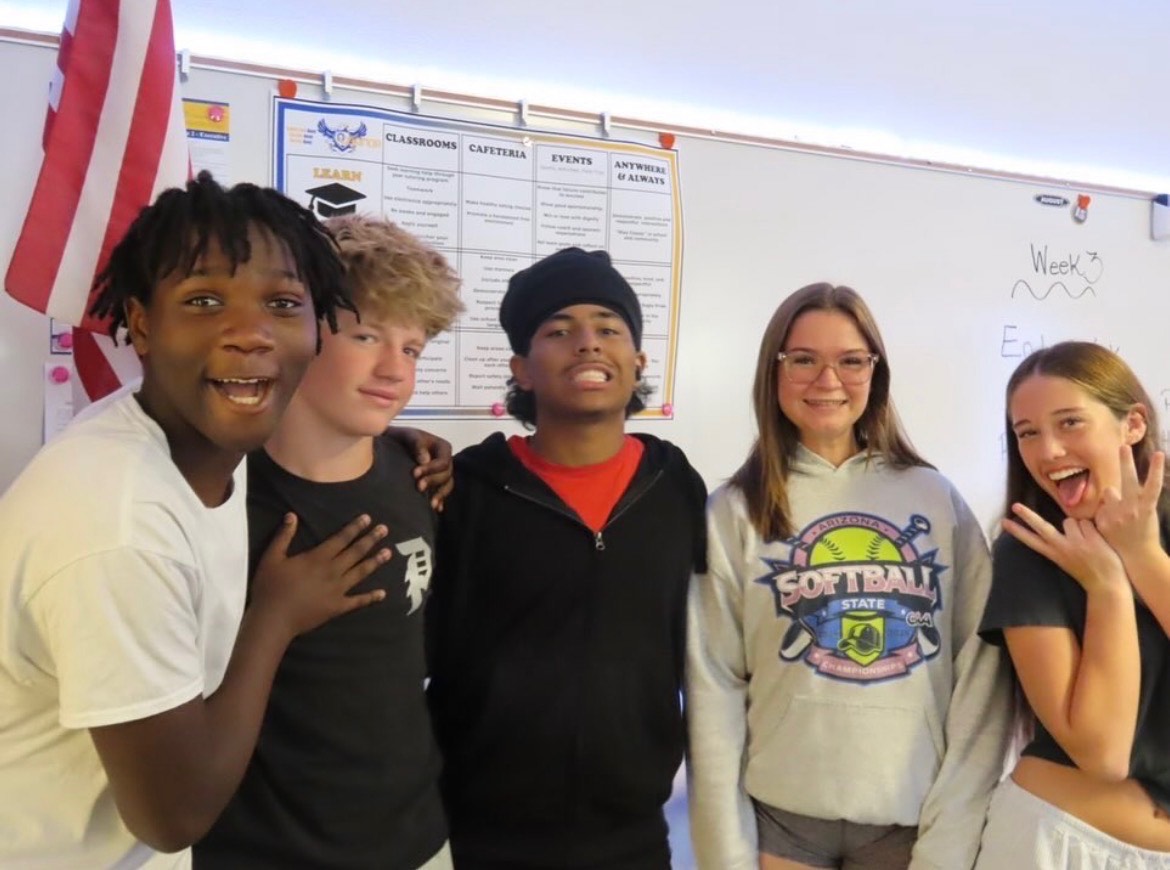 Freshmen in Erica Calderon’s class share smiles for new school year.