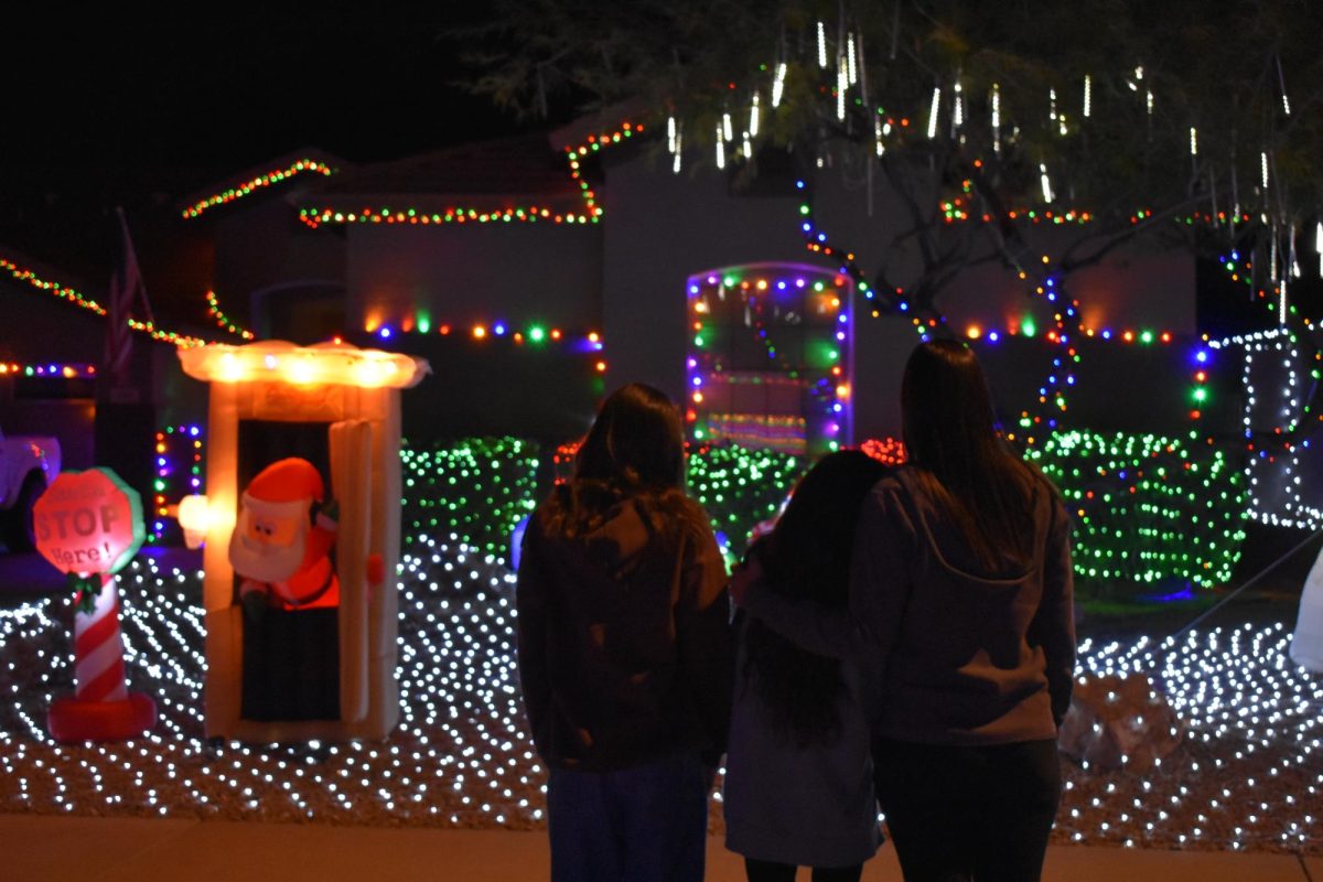 Families around town enjoy looking at the Christmas lights.